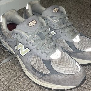 Men’s New Balance 2002r. Used but in good condition and cleaned.